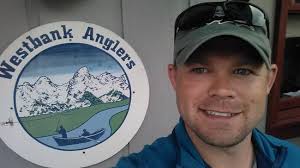 Guide Charles Burd holding a fish I caught