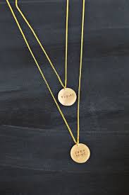Inspired by crafts, for girls, and for girlfriends. Make Your Own Hand Stamped Necklace A Beautiful Mess Metal Stamped Jewelry Hand Stamped Necklace Diy Jewelry Pendants