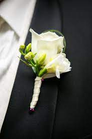 White Rose With White Freesia Boutonniere Simple And Sweet Rose Boutonniere White Rose Boutonniere Boutonniere Wedding
