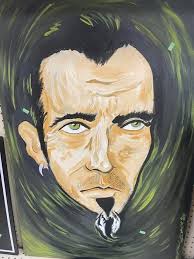 Found and left at goodwill in Charleston, SC. Only 4.99 Hand painted, I'm  not sure if it's a vampire 🧛‍♂️ or if it's the lead singer of Sugar Ray, Mark  Sayers McGrath.