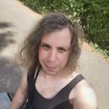 Nothing to see here, just 2 Judas Priest guitarists rollerskating in the  park.