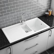 The right sink can be a focal point in your kitchen, so if you want to make a real style statement, a black kitchen sink is the way to do it. Reginox White Ceramic 1 5 Bowl Kitchen Sink At Victorian Plumbing Uk