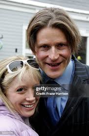 Actor Guy Pearce and Georgia Archer walk