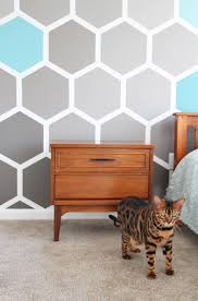 I love a graphic wall treatment, and a hexagon pattern is especially fun. Grosgrain Honeycomb Ombre Hexagon Accent Wall