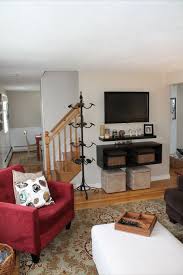 Floating Shelves With Floating Tv Like The Idea Of Putting Ottomans Under For Extra Seatin Floating Shelves Floating Shelves Living Room Ikea Floating Shelves