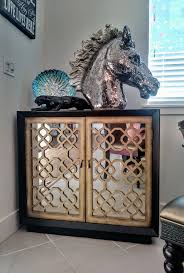 Designed By Jeston Whitacre Glass Horse From Ashley Furniture In Woodbridge Va Aqua Shell Decor From World Market Shell Decor Ashley Furniture Wood Bridge