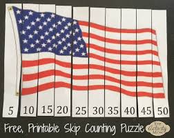 Secret box with american flag, stars are painted with metallic gold paint. The Activity Mom American Flag Printable Skip Counting Puzzle The Activity Mom