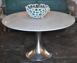 Discover round shape dining table featuring a stylishly varied range of different colours, materials and finishes. 52 Stone Top Dining Table With Hammered Metal Base Mecox Gardens