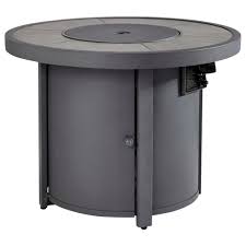 Light the fire pit table and run the burner on high for 30 minutes. Signature Design By Ashley Donnalee Bay 10268584 Round Fire Pit Table Pilgrim Furniture City Outdoor Fire Pits