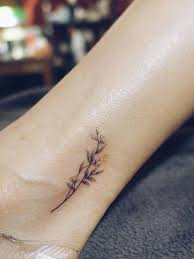 16 Delicate Flower Tattoos Just In Time For Your New Spring Ink Black Flowers Tattoo Delicate Flower Tattoo Tattoos