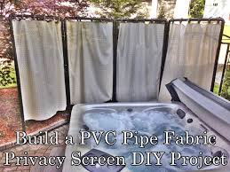 Cutout holes from the surface of pvc pipe lengths! Build A Pvc Pipe Fabric Privacy Screen Diy Project The Homestead Survival