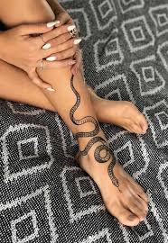 54 Beautiful Foot Tattoos To Show Off This Spring Lily Fashion Style Tiny Foot Tattoos Foot Tattoos Snake Tattoo Design