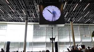 Need to compare more than just two places at once? Human Clock At Amsterdam Airport