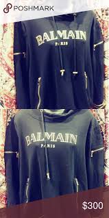Balmain Black And Gold T Shirt Balmain Paris Black Hoodie Black Hoodie With Gold Zippers And Gold Lines On Sleves And Bottom Barely Worn Like Ne Black Hoodie Balmain Shirt Sweatshirt Shirt