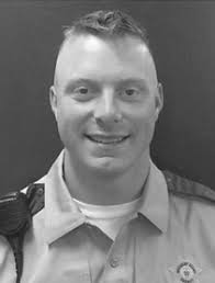 Major John Godar Passes the ISSDA Gavel to Johnson County Sheriff Lonny  Pulkrabek