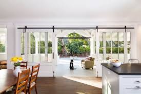 She came back with this fantastic concept of using barn doors as window coverings in a bedroom. Architectural Accents Sliding Barn Doors For The Home