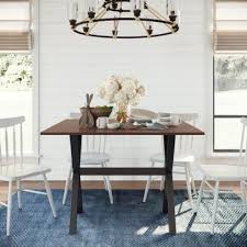 It has a round tabletop with molded edges and tonal geometric details on its surface. 12 Best Small Space Dining Tables 2021 Hgtv