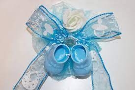 You can choose either fresh or silk flowers or you can make a bouquet out of baby socks. Baby Corsages Baby Showers Online