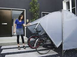 Eine Fahrradgarage Muss Keineswegs Ein Schuppen Sein Die Hersteller Legen Mittlerweile Wert Auf Ansprechendes Fahrradgarage Fahrrad Unterstand Fahrradschuppen