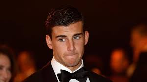 North Melbourne congratulates former Director, Peter De Rauch, and club  doctor, Peter Baquie, for being recognised in the Queen's Birthday Honours  List for their respective services to the football industry and across