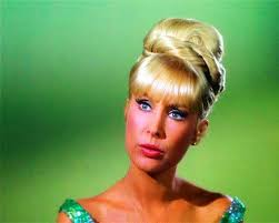 Hubert and Geneva Stagg and Jeannie Landry in pink sweater.