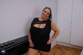 Curvy German grandma with big tits having sex with a young man - Mature.nl