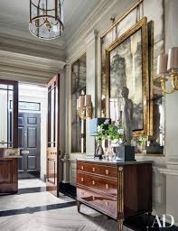 Dark tiny mudroom bench with baskets. 42 Entryway Ideas For A Stunning Memorable Foyer Architectural Digest