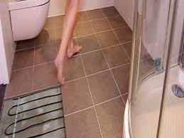 Another great benefit of heated floor tiles in your bathroom is that this hating system is incredibly silent. Heated Bathroom Floor Cost Heated Tile Floor Tile Floor Flooring Cost