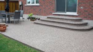 I have a large back patio that is all exposed concrete aggregate, typical grey, everything else about house is in brown and tan tones, would like to stain patio slab to a brown/tan color. Exposed Aggregate Concrete Hamilton Pro Pavement Services Ltd