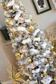 Silver Gold And Light Green Snowy Christmas Tree A Wonderful Thought Snowy Christmas Tree Christmas Tree Decorations Christmas Tree Themes