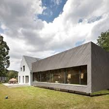 Family House Extension By Franz Architekten Clad With Diagonal Strips Of Larch Architecture House Exterior House Extensions