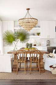 We would suggest that you check out these amazing table centerpiece ideas that would help you attain glamorous dining rooms. 10 Best Tropical Dining Room Decor Ideas