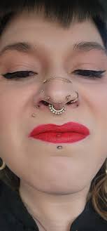 I'm bored with my set up again… what else should I get i have both  eyebrows,septum,tongue,bellybutton and vertical labret. i really feel i  need one more😆