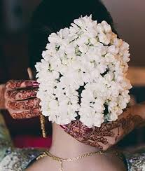 Indian bridal hair bun with flowers. 40 Indian Bridal Hairstyles Perfect For Your Wedding