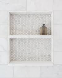 Mossman Builders On Instagram Shower Niche A Gorgeous Duo Of Carrarra Marble Tiles Comprising Of Penny Rou Shower Niche Tile Shower Niche Shower Tile
