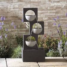 Water feature is one or more items from a range of fountains, pools, ponds, cascades, waterfalls, and streams that is part of landscaping and garden design. Serenity Modern Granite Effect Cascading Bowls Water Feature Waltons