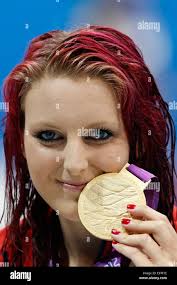 Jessica-Jane Applegate of Great Britain celebrates with her gold medal  after winning the women's 200m Freestyle