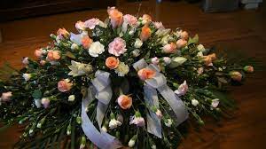 Wood caskets are perhaps the most popular of casket types in today's culture. Light Pink And Apricot Casket Flowers