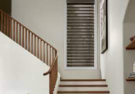 Roll up blinds can accommodate high staircase windows without a hitch and it also has several fabric choices with different openness factor to choose from. Hunter Douglas Window Treatment Ideas Denver Area Homes