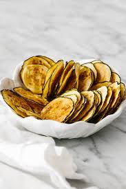 Dip the zucchini in the flour, then in egg, and then through the breadcrumb mixture. Baked Zucchini Chips Thin Crispy Downshiftology