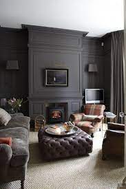 Dark furniture works with beige walls. Bringing Wall To Wall Carpet Back Dark Living Rooms Interior Interior Design