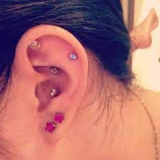 Conch Orbital Cartilage And Lobe Piercings All By Rockstar Body Piercing In Providence Ri Lobe Piercing Body Piercing Nose Ring