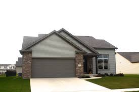 The four most common roofing colors i noticed were black, brown, gray and even a terracotta red. Weathered Wood Roof Dark Brown Trim Irish Light Green Siding Bloomington Il Carlson Exteriors Inc