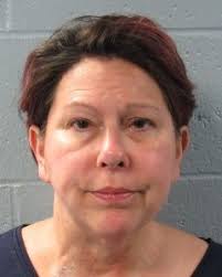 One arrested after car crashes into Ziggyz shop in Edmond