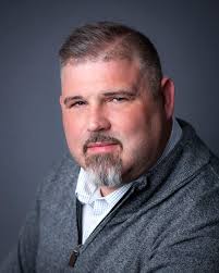 This is a German shepherd who's actually a dynamic motivational speaker and  part time podcaster.