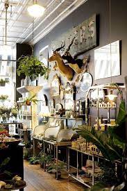Eclecticism On Display At Asrai Garden In Chicago Design Sponge Flower Shop Interiors Flower Shop Design Store Design Interior