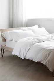 Go boho chic with bohemian bedding, or style your room neutral sheets and duvets for a minimal, elegant look. White Flannel Au Lit Fine Linens Bedding Master Bedroom Minimalist Bed Simple Bedroom