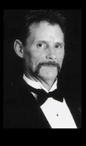 William D. Crum (1956-2010)