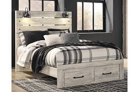 Its traditional touch with moldings adds a different appeal to this wooden platform bed with storage. Cambeck Queen Panel Bed With 2 Storage Drawers Ashley Furniture Homestore