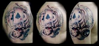 These iconic squares are very easy and affordable to get inked, but they pronounce a truly heightened form of machismo. Shoulder Dice Card Tattoo By Crossover